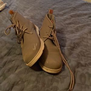 Selling a pair of Oliver mason high tops two small marks on them